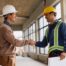 Subcontractor Prequalification - Contractor Shaking Hands With Subcontractor on a construction Work site.